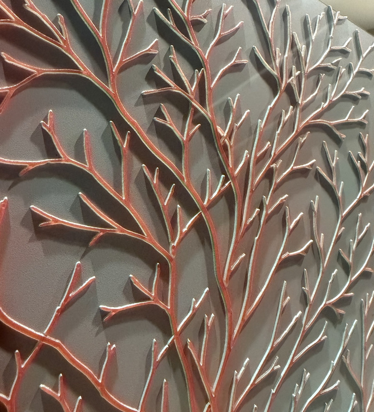 Warm metallic edges catching the light on botanical branches